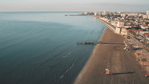 Aerial View City Sandy Beach Near Blue Sea