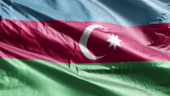 Azerbaijan textile flag waving on the wind. Slow motion. 20 seconds loop.