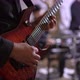 Guitarist Playing Electric Guitar Music on Stage at Rock Concert Indoors - VideoHive Item for Sale