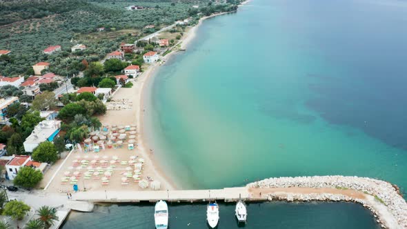 Drone Flying Over Beautiful Beach on the Coastline and Sea with Beautiful Turquoise