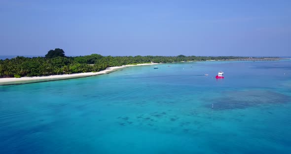 Luxury aerial travel shot of a summer white paradise sand beach and aqua turquoise water background 