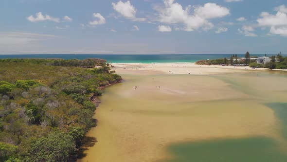 Aerial drone view of beach at Currimundi Lake, Caloundra, Sunshine Coast, Queensland, Australia