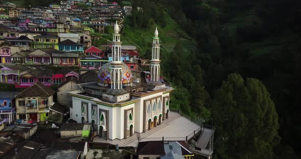 Aerial drone shot of famous Mosque in Indonesia during sunny day -Butuh Village