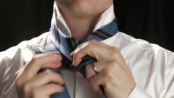 Tie dressing by anonymous businessman studio