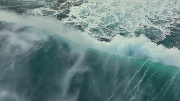 Aerial Top Down View of Huge Storm Wave Crashing on the Atlantic Coast