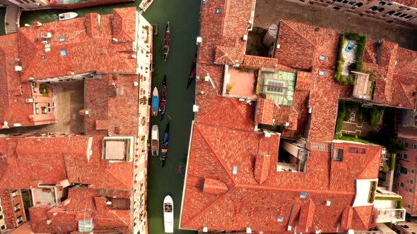 Narrow canals and orange rooftops in Venice