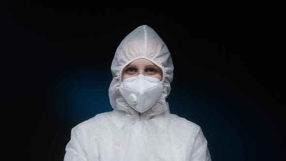 Woman Doctor Wearing White Protective Medical Uniform PPE Suit Coronavirus Protection Dangerous