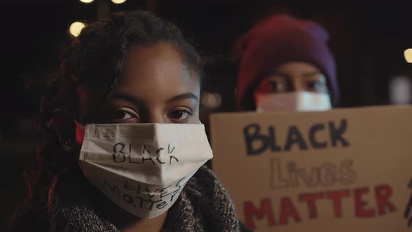 African-American woman demonstrating against racism