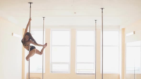 Woman Exercise Pole Dance. Slow Motion