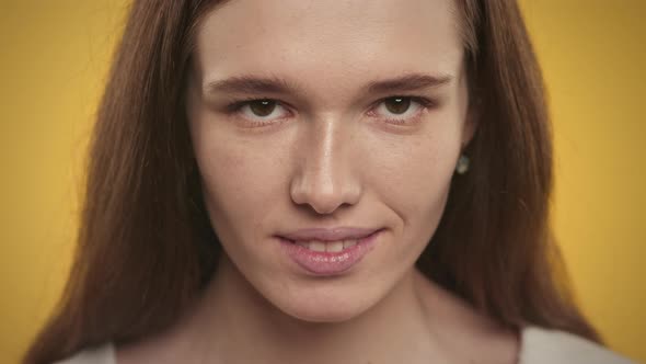 Extreme Close Up of a Smiling Caucasian Young Adult Woman