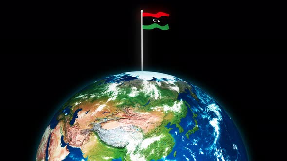 Flag Of Libya Flying Flag On The 3d Rotated Planet Earth
