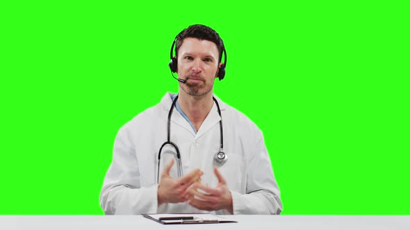 Caucasian male doctor on green screen background