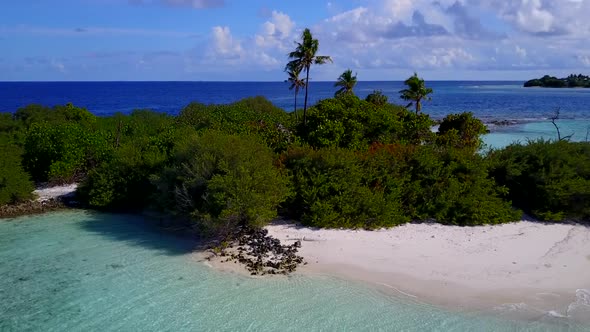 Drone landscape of marine shore beach by blue sea and sand background