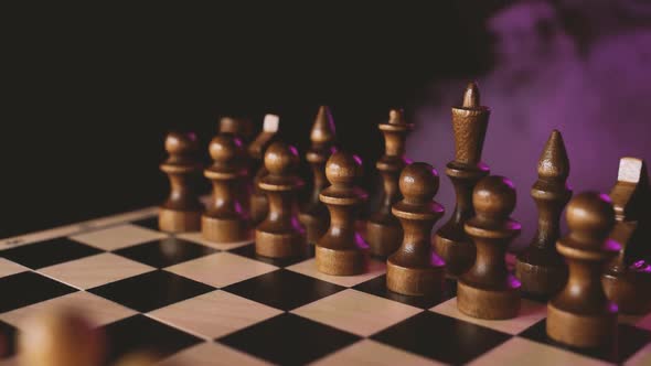 Close Up of White Chess Pieces on Board with Dissipating Steam