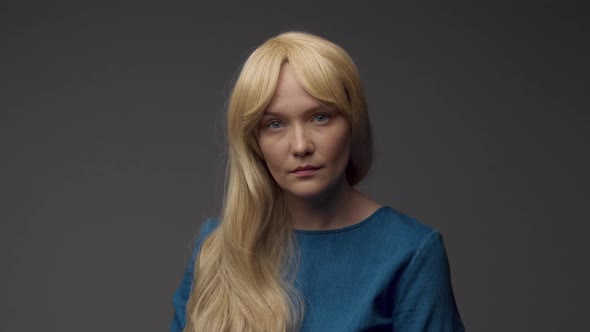 Nordic Blond Model in Studio with Dramatic Top Light