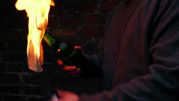 Man Hurls Molotov Cocktail In The Evening