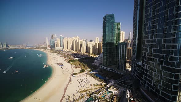 Aerial view of Dubai skyline with beautiful beach, United Arab Emirates.