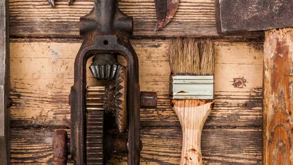 Old vintage hand tools on wooden background