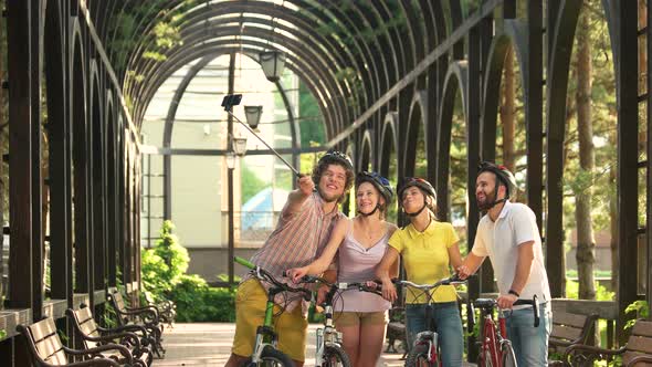 Four Beautiful Friends with Monopod Outdoors