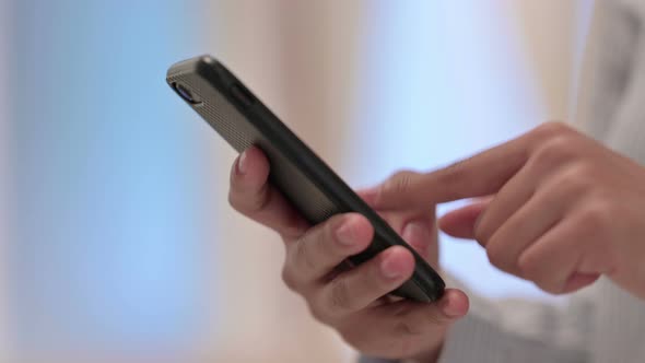 Close Up of Hands of Woman Using Smartphone