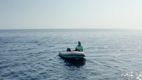 Man Fishing in the Sea