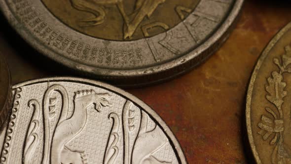 Rotating stock footage shot of international monetary coins