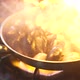 Stirring and Closing Burning Mussels and Scallops with Pan - VideoHive Item for Sale