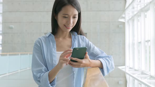 Woman looking at mobile phone 