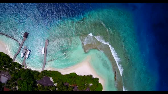 Aerial flying over tourism of tranquil bay beach time by blue ocean and white sandy background of a 