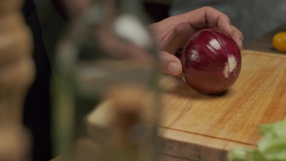 Professional Chef Cuts Red Onion