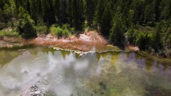 Beautiful small Lake in the Mountains Drone Video
