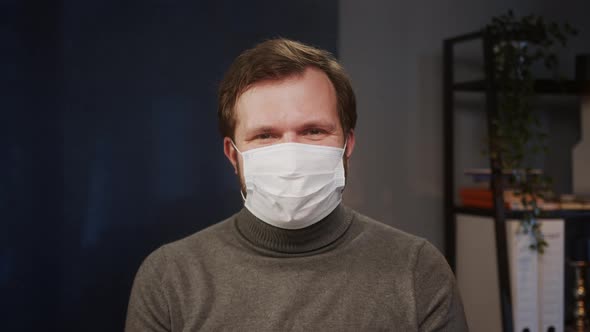 Portrait of Experienced Man Smiling Doctor Wearing Medical Mask Looking in Camera Posing Closeup of