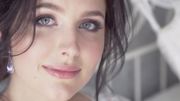 Portrait of Brunette Girl with Gray Eyes Slow Motion