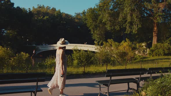 Young girl in Central Park in summer day