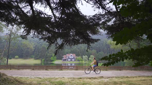 Free young man cycling in nature.