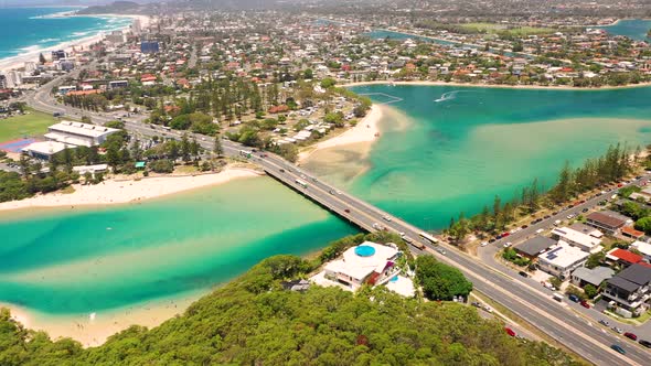 Aerial view of bridge crossing the Tallebudfera Ceek river, Australia.