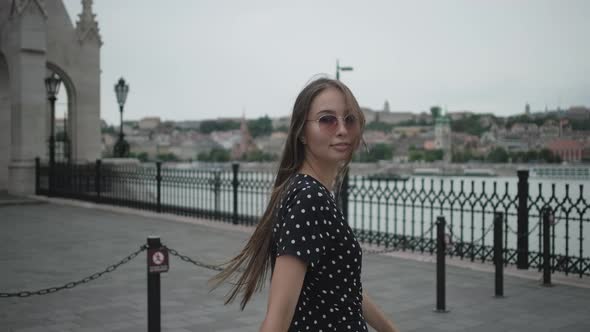 Girl Looking at Budapest From Waterside Kossuth Square Hungary