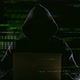 Hacker Opening Laptop to Check Virus Breaking System Codes, Stealing Data - VideoHive Item for Sale