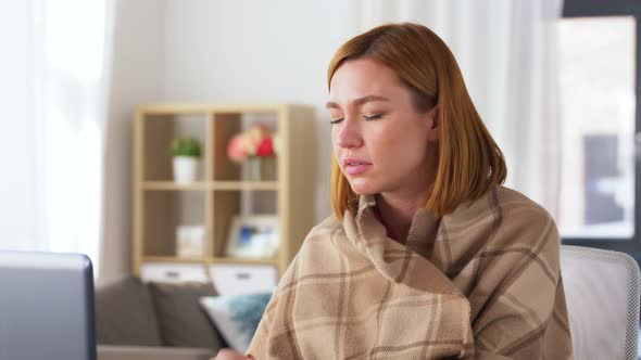 Sick Woman Having Video Call on Laptop at Home