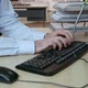 Office worker using computer keyboard - VideoHive Item for Sale