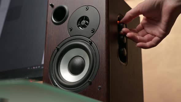 hand turns on and off the music on the speaker. The speaker diffuser vibrates