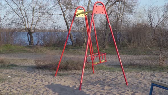 Empty Swings In Playground