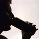 The Silhouette of Male head drinking from a aluminum can - VideoHive Item for Sale