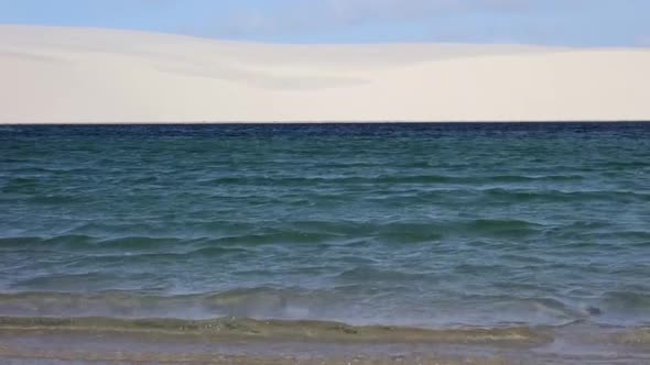 Tight Shot of Flowing Water in Freshwater Lagoons Formed in the Dunes.