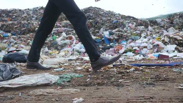 Legs Walking At Mountain Garbage