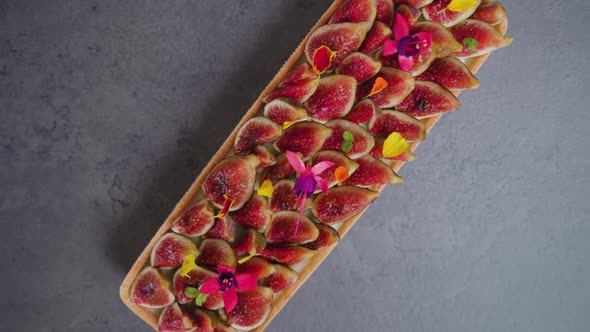 Biscuit with Fig Slices Flowers and Colorful Leaves on Top