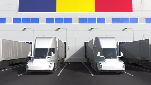 Electric Trucks at Warehouse Loading Bay with Flag of ROMANIA