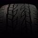 Car Tire Rotation Close-up on Black Background - VideoHive Item for Sale
