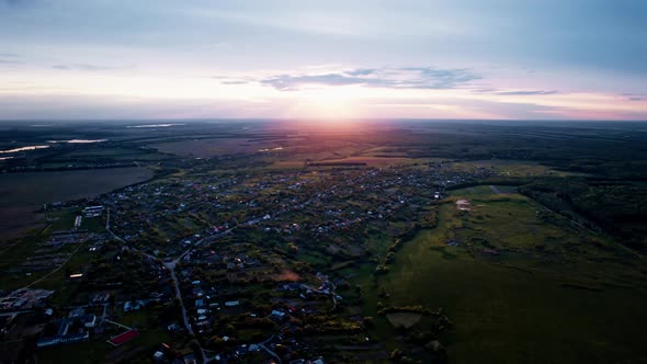 Aerial View of Beautiful Village in at Sunset in Summer