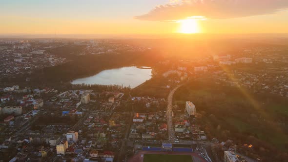 Aerial drone view of Chisinau. Panorama view of multiple buildings, roads and bare trees